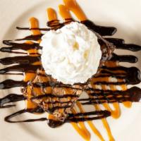 Choc. Gooey Buttercake · Moistest, gooey-ist brownie cake ever! Covered in chocolate and caramel sauce with pecans an...