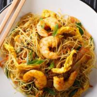Singapore Curry Mei Fun · Spicy. Rice vermicelli tossed with bean sprouts onion Napa with light and flavorful yellow c...