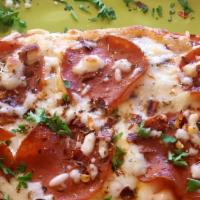 Pepperoni · Perfectly toasted flatbread with our signature tomato sauce, topped off with mozzarella, ita...
