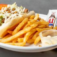Philly Cheese Steak · Served with grilled onions, green peppers, mushrooms, lettuce, tomato, mayo and mozzarella c...