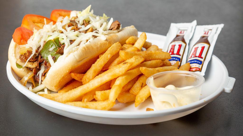 Philly Cheese Steak · Served with grilled onions, green peppers, mushrooms, lettuce, tomato, mayo and mozzarella cheese.