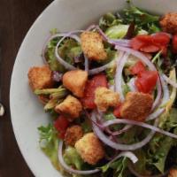 House Salad · Baby spring mix with smoked tomatoes, buttermilk ranch dressing, red onions and doc's crouto...