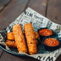 Mozzarella Logs · Hand-battered with panko bread crumbs.