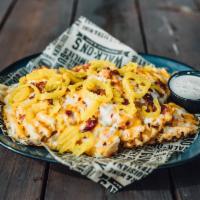 Waffle Cheese Fries · Jack, cheddar, red pepper flakes, bacon, banana peppers.