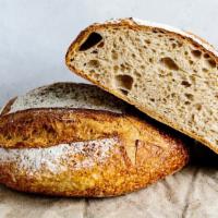 La Farm Bread - 1/2 Loaf · Made with locally milled organic flours, this light sourdough is crafted using a traditional...