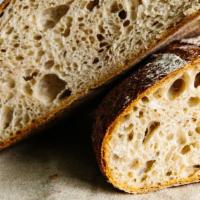 La Farm Bread - 1/4 Loaf · Made with locally milled organic flours, this light sourdough is crafted using a traditional...