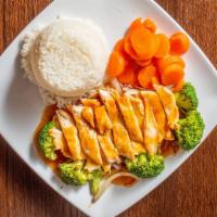 Chicken Teriyaki · Served with white rice and vegetable included broccoli onion and sweet carrots.