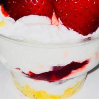 Strawberry Shortcake Sundae  · One scoop of Icecream, Vanilla or Strawberry, angel food cake fresh strawberries & sauce whi...