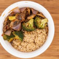 Mongolian Beef · Stir fried flank steak with broccoli, onion, and mushrooms in a spicy, sweet ginger sauce.