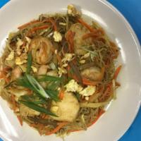 Singapore Rice Noodles · Gluten free, hot. Egg. Stir fried chicken, shrimp and pork in angel hair rice noodles with I...