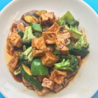 Tofu Szechuan · Vegetarian, hot. Crispy tofu with mixed green vegetables in spicy plum sauce.