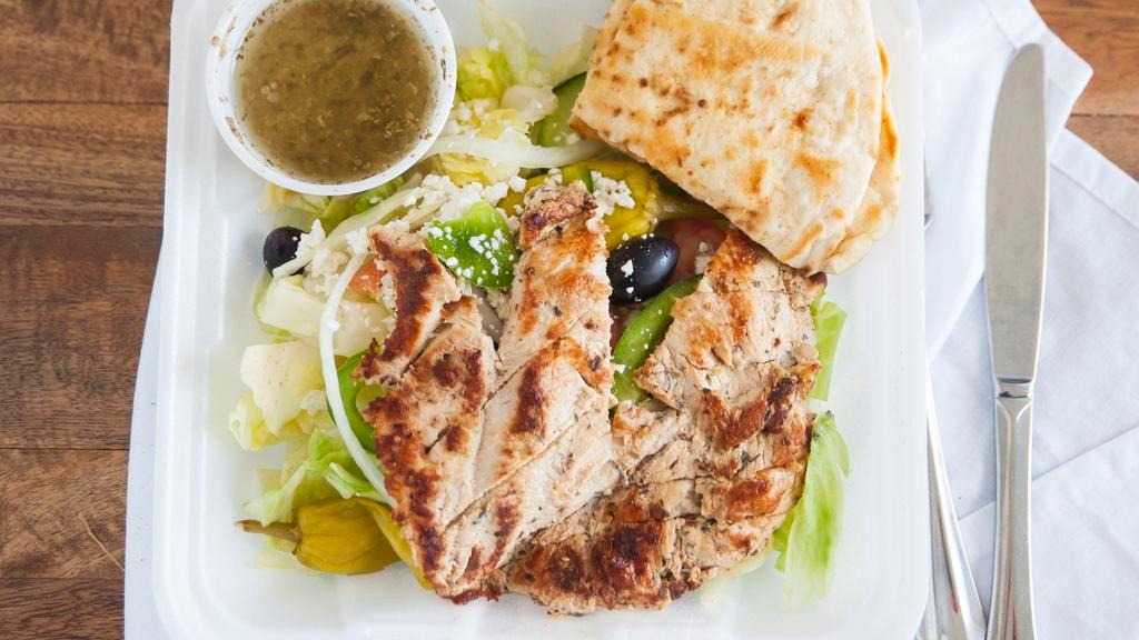 Greek Chicken Salad · Lettuce,peppers cucumbers, tomatoes, onions, kalamata olives pepperoncini and feta cheese, topped with marinated grilled chicken breast. Served with pilaf bread Greek dressing.