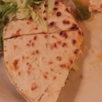 Fajita Quesadilla · Stuffed with mixed cheeses, chicken fajitas, grilled onions, peppers, garnished with lettuce...