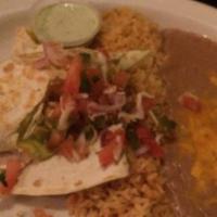 Pepperjack Enchilada · No meat. Sauteed red and green peppers, corn and tomatoes, spinach, pepperjack cheese, accom...