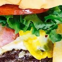 Bird Burger · Cheeseburger with bacon and egg.