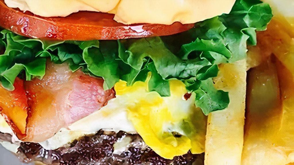 Bird Burger · Cheeseburger with bacon and egg.
