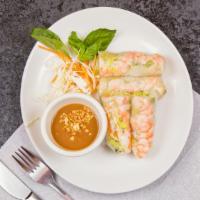 Spring Roll · Two fresh rolls stuffed with rice noodles, fresh lettuce, mint leaves, cilantro, and spring ...