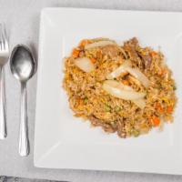 Thai Fried Rice · Jasmine rice, egg, carrots, peas, onions.