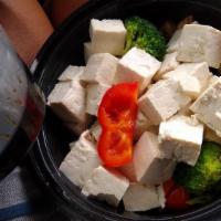 General Tofu · Spicy. Diced tofu breaded, delicately fried, tossed in a spicy sauce along with broccoli, mu...