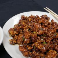 Crispy Scallion Chicken · Spicy. Diced breaded chicken gently fried until crispy, then sautéed with the chef's spicy c...