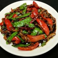 Shredded Pork With Black Bean Sauce · Spicy. Fresh snow peas and red bell peppers sautéed with pork in black bean sauce.