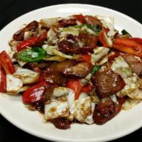 Twice Cooked Pork · Sliced BBQ roasted pork sautéed with cabbage, mushrooms and red bell peppers with hints of p...
