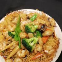 Shrimp Crispy Fried Noodles · Shrimp sautéed with mixed Chinese vegetables sautéed in brown gravy sauce served over crispy...