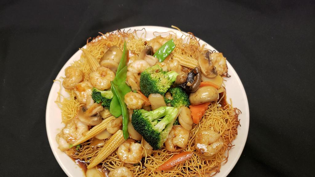 Shrimp Crispy Fried Noodles · Shrimp sautéed with mixed Chinese vegetables sautéed in brown gravy sauce served over crispy noodles.