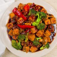 General Tofu · Spicy. Breaded tofu gently fried then sautéed with red bell peppers, mushrooms, and broccoli...