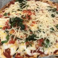 Classic Tomato Basil Flatbread · Melted mozzarella, Parmesan and cheddar jack cheeses, tomatoes, fresh basil and marinara sau...