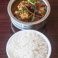 Chicken Chettinad · Chicken simmered in coconut milk and slow cooked with fennel, coriander, pepper, cardamom, a...