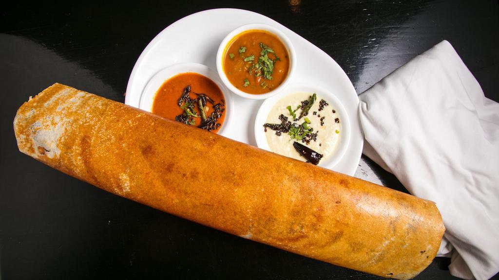 Plain Dosa · South indian style crepe of rice and lentils.