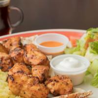 Chicken Shish Plate · Marinated Chicken Breast Cubes Chargrilled Served wit hot sauce and garlic sauce