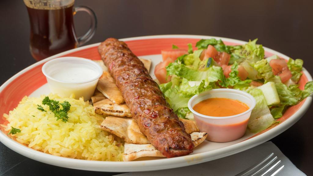 Adana Kebab Plate · One Spicy Chargrilled Brochette Served with Taziki Sauce and Hot Sauce
