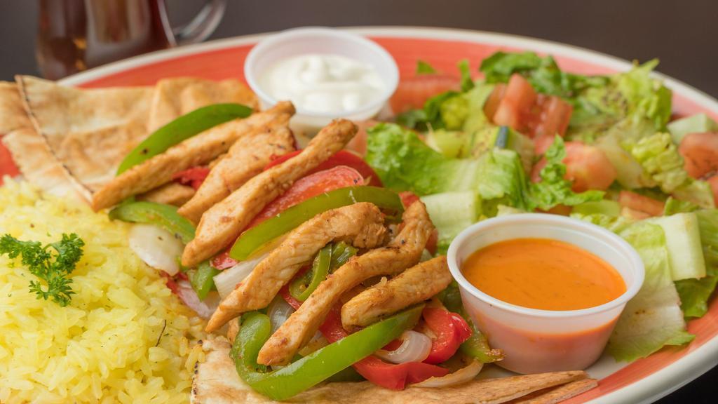 Chicken Fajita Plate · Marinated Chicken Strips With Onion and Peppers Served with Garlic Cream and Hot Sauce