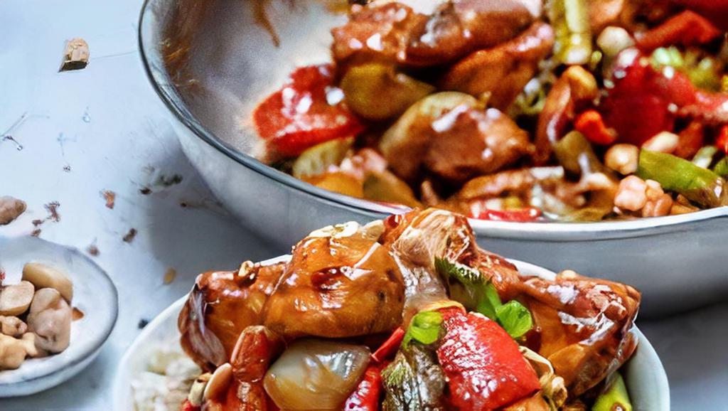 Kung Pao Chicken (Spicy) · Stir fried chicken with diced bamboo shoots, bell peppers and peanuts in spicy brown sauce.