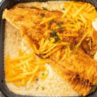 Fish & Grits · Fried flounder & our creamy grits
