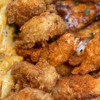Fried Shrimp, Wings &  1/2 Lobster Mac · Wing Flavors:
Jerk
Hot
Carolina BBQ
Cajun
Lemon Pepper 
House
Parmesan