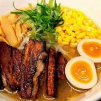 Shoyu Paitan (Soy Sauce) · Char Siu pork in our creamy chicken broth, topped with scallions, bamboo shoots, corn,  & se...