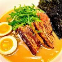 Miso Paitan · Char Siu pork and special made miso sauce in our creamy chicken broth, topped with scallions...