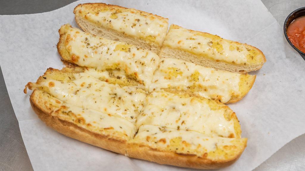 Garlic Cheese Bread · Italian bread cut to eight pieces, topped with garlic butter, oregano and melted mozzarella cheese. Comes with marinara sauce on the side.