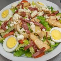 Cobb Salad · Romaine lettuce, tomato, avocado, bacon, hard-boiled egg, grilled chicken and feta cheese.