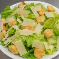 Classic Caesar Salad · Romaine lettuce, seasoned croutons, parmesan cheese.