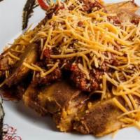 Chili Tamale Dinner Mild · 6 tamales with chili, cheese and onions