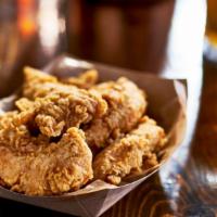 Chicken Tender Po'Boy · Fresh fried chicken strips with your choice of side. Comes with all the classic toppings in ...
