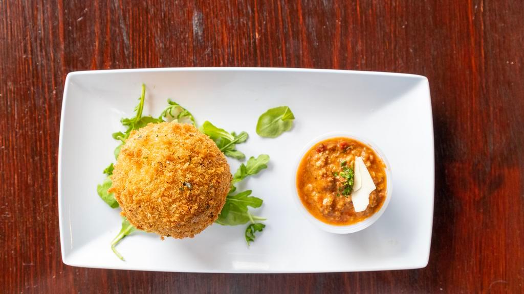 Arancini Riceballs · Served with our bolognese sauce.