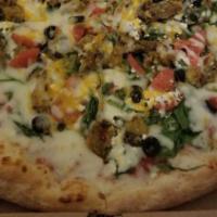 Mediterranean Pizza · Fresh spinach, tomatoes, black olives, eggplant, feta cheese, a touch of cheddar cheese. We ...