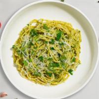 Pesto Pasta · Fresh basil leaves, garlic, grated parmesan cooked with spaghetti.