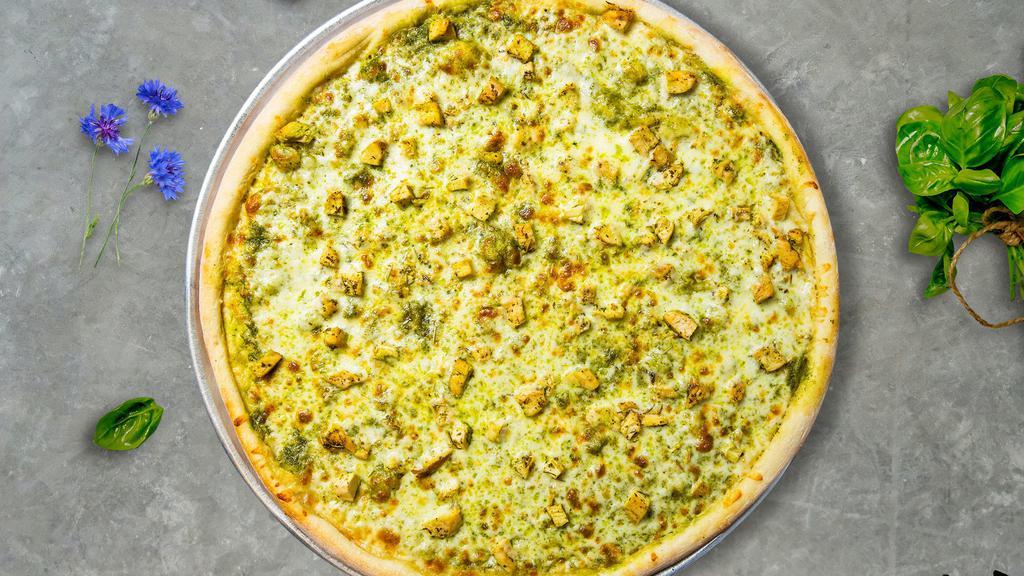 Chicken Pesto Pizza · Take your pick of our famous house made or gluten-free dough topped with pesto sauce, chicken, tomato, green peppers and premium mozzarella.