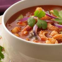 Menudo · Traditional Mexican soup made
with tripe and lengua, cooked
in a red chili pepper-base broth...